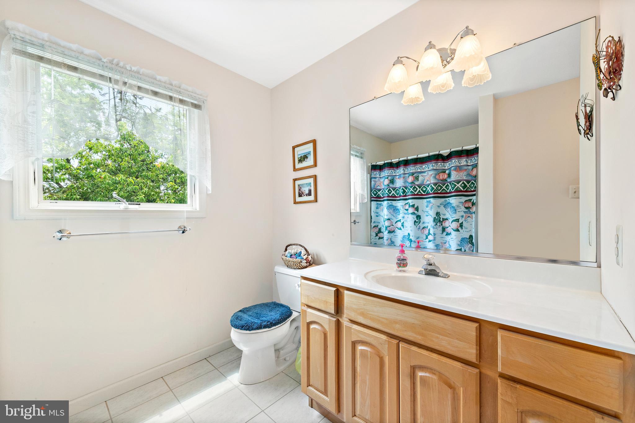 57 Sunset Boulevard Long Beach Township, NJ 08006 - Photo 37 of 65 Bath off the bedroom with tiled floors