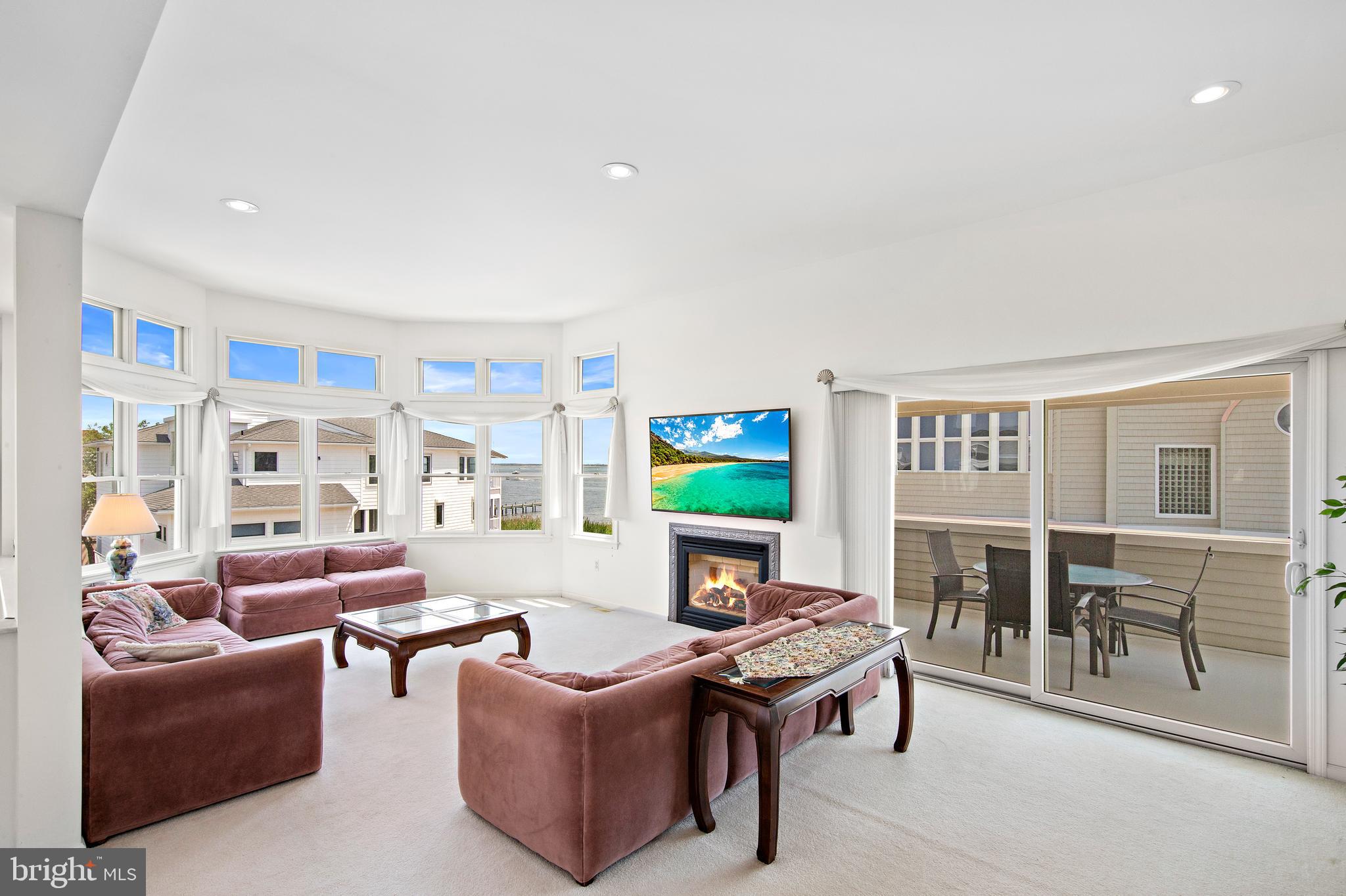 57 Sunset Boulevard Long Beach Township, NJ 08006 - Photo 9 of 65 Living room has gas fireplace