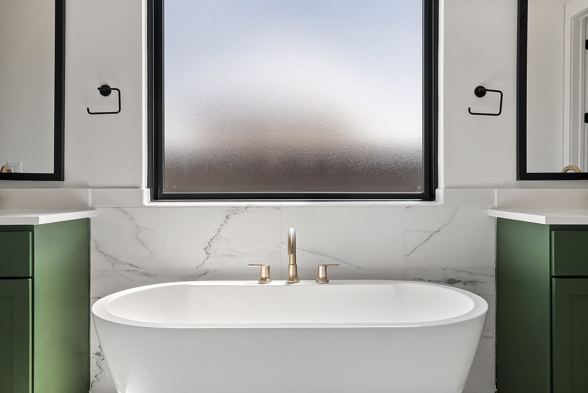 6010 Adhara Pass Austin, TX 78730 - Photo 15 of 38 a white bath tub sitting in a bathroom