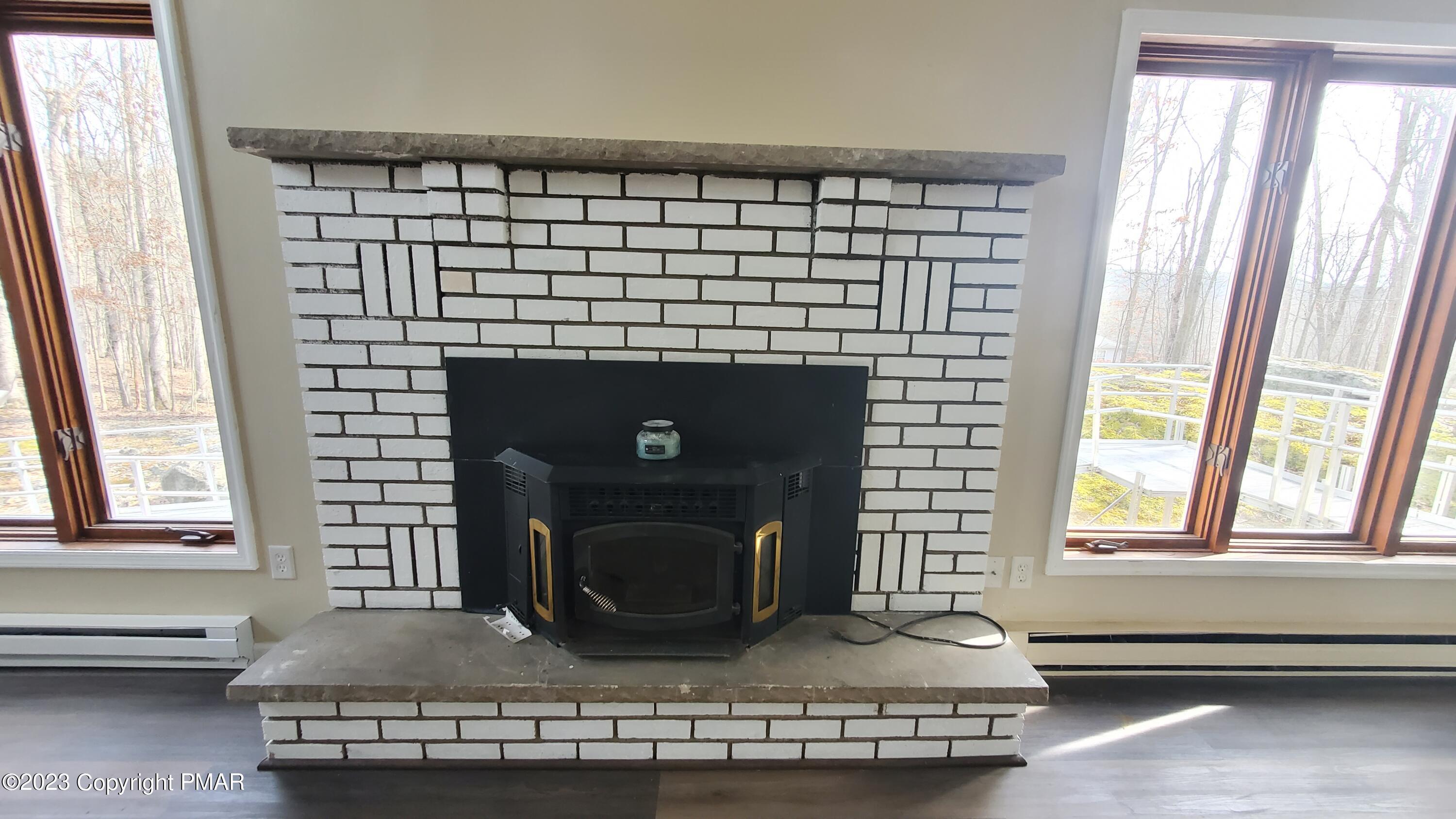3118 Snowden Drive Bushkill, PA 18324 - Photo 15 of 27 Livingroom brick fireplace
