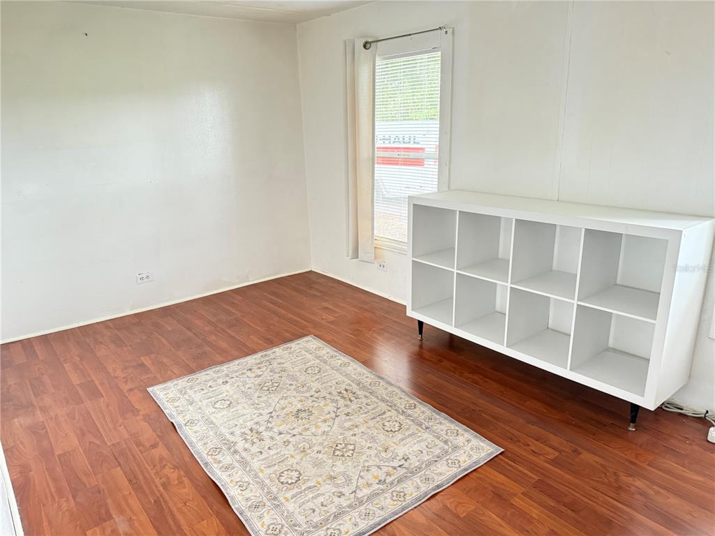 3545 Southwest 90th Street Ocala, FL 34476 - Photo 13 of 24 an empty room with wooden floor and closet
