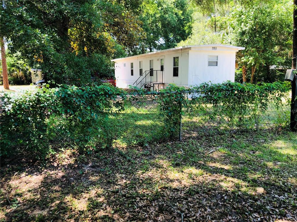 3545 Southwest 90th Street Ocala, FL 34476 - Photo 2 of 24 a view of a small garden
