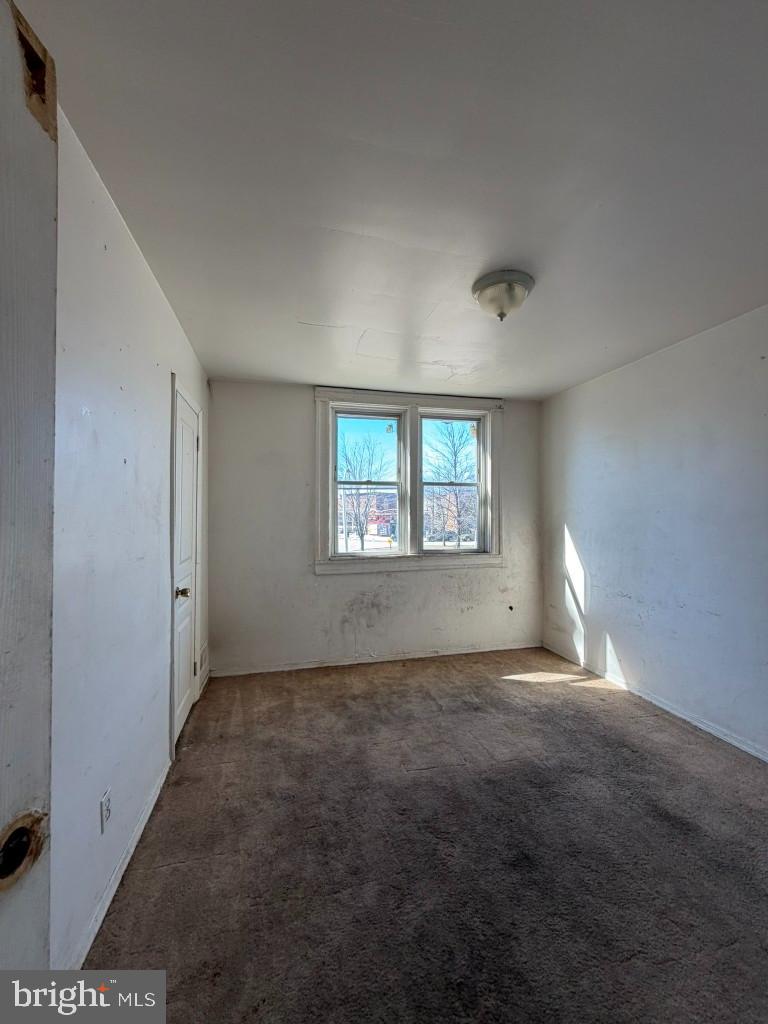 4519 Pall Mall Road Baltimore, MD 21215 - Photo 12 of 19 a view of an empty room with a window