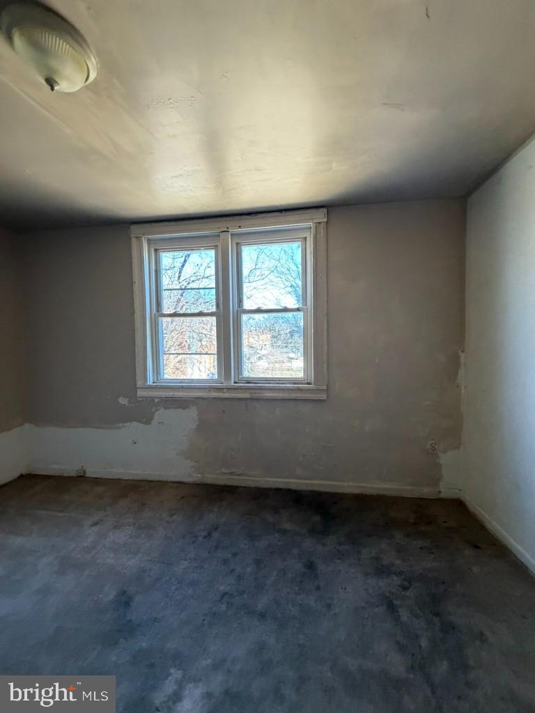 4519 Pall Mall Road Baltimore, MD 21215 - Photo 15 of 19 an empty room with a window