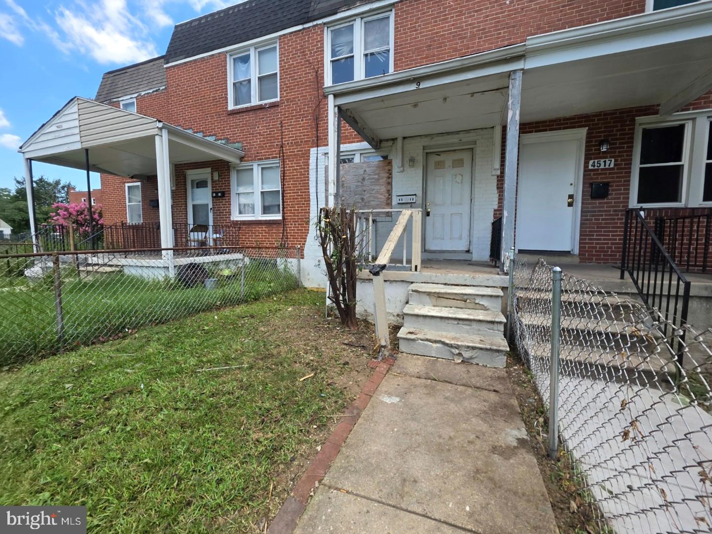 4519 Pall Mall Road Baltimore, MD 21215 - Photo 2 of 19 a front view of a house with a porch