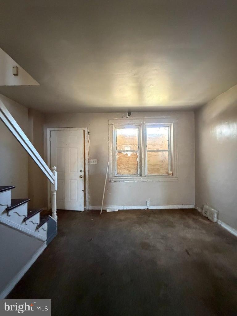 4519 Pall Mall Road Baltimore, MD 21215 - Photo 4 of 19 a view of an empty room with a window