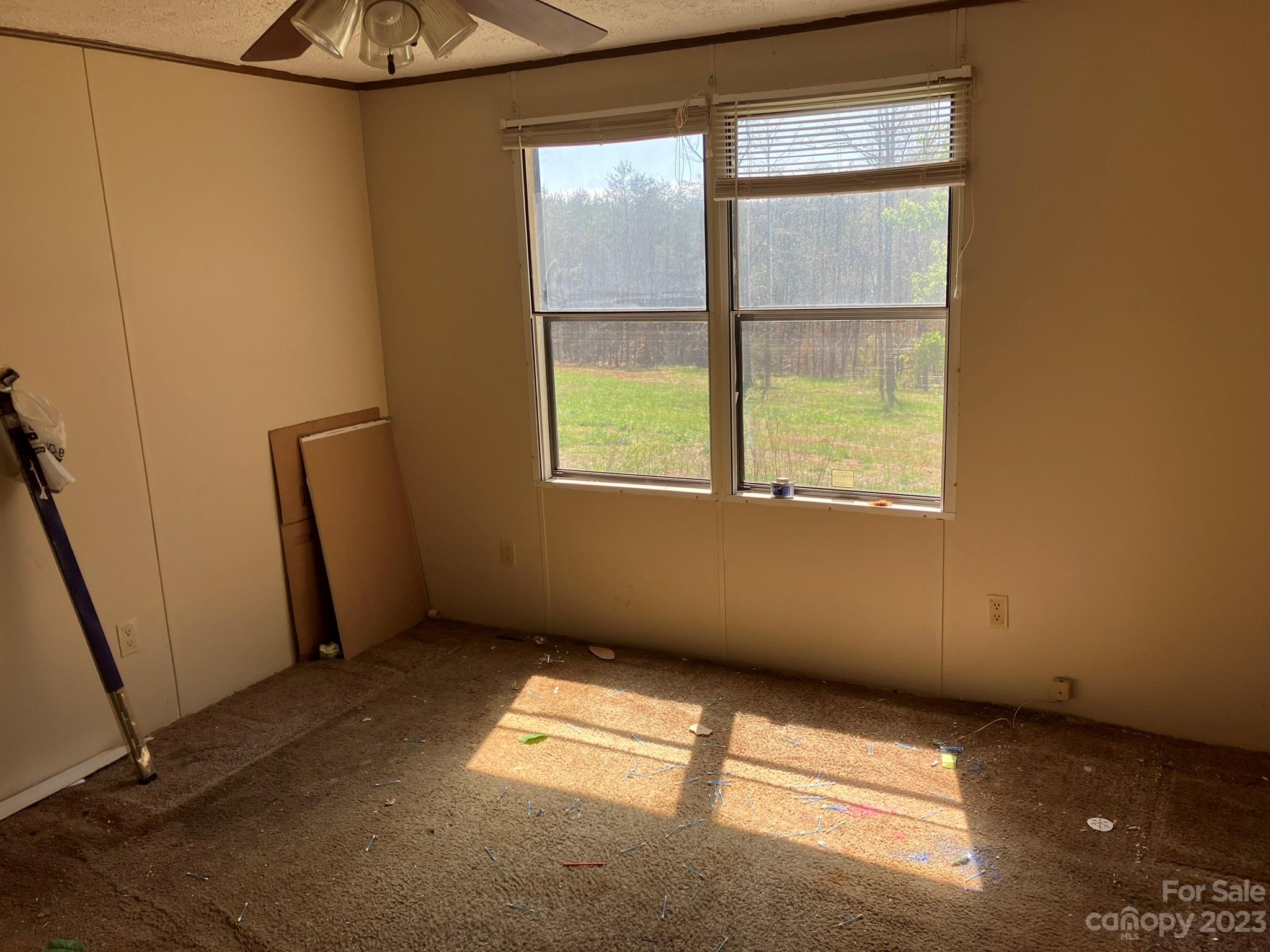 248 Old Ross Road, Unit 2 Spindale, NC 28160 - Photo 11 of 16 a view of an empty room with a window