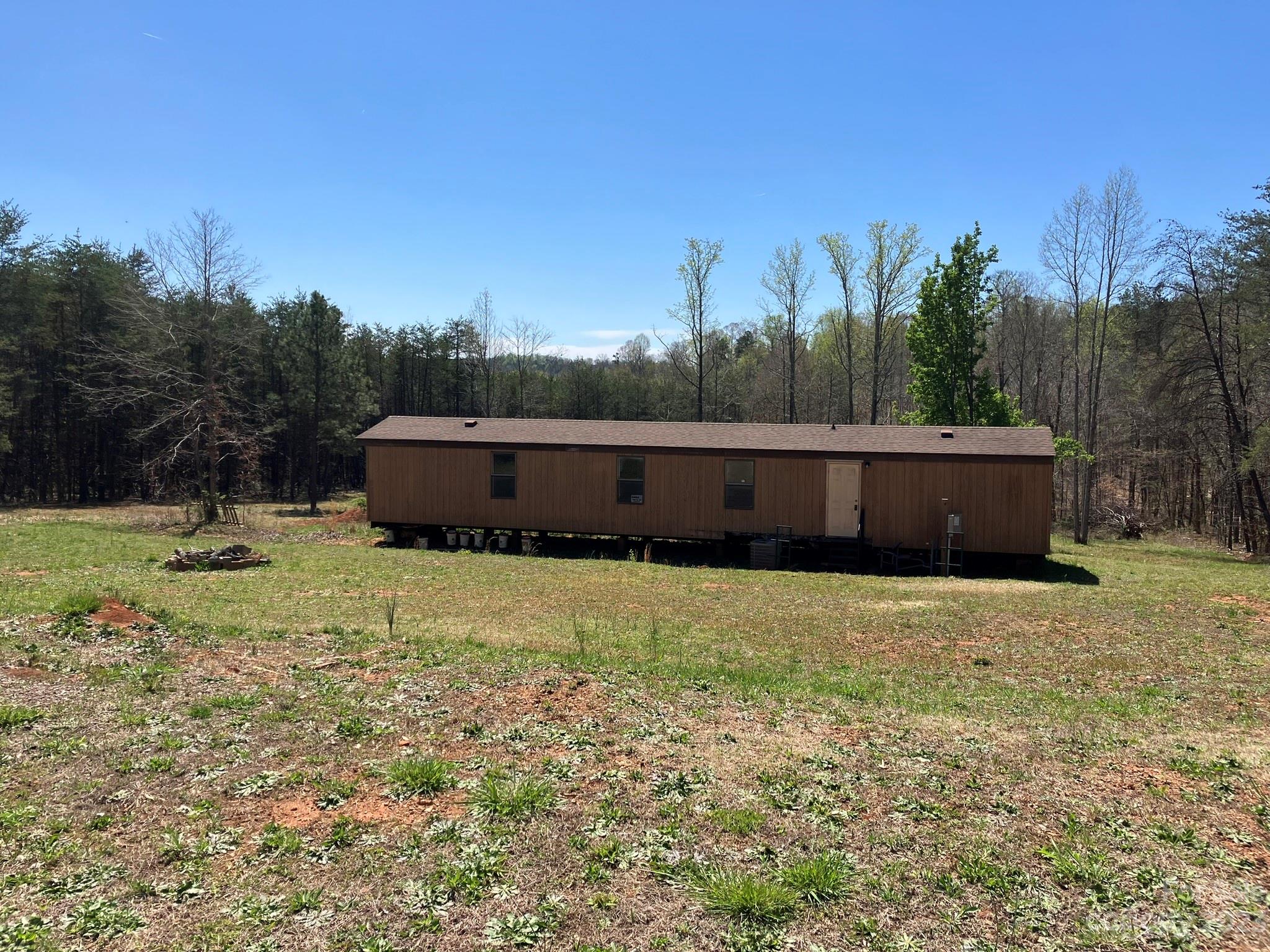 248 Old Ross Road, Unit 2 Spindale, NC 28160 - Photo 2 of 16 a view of a yard