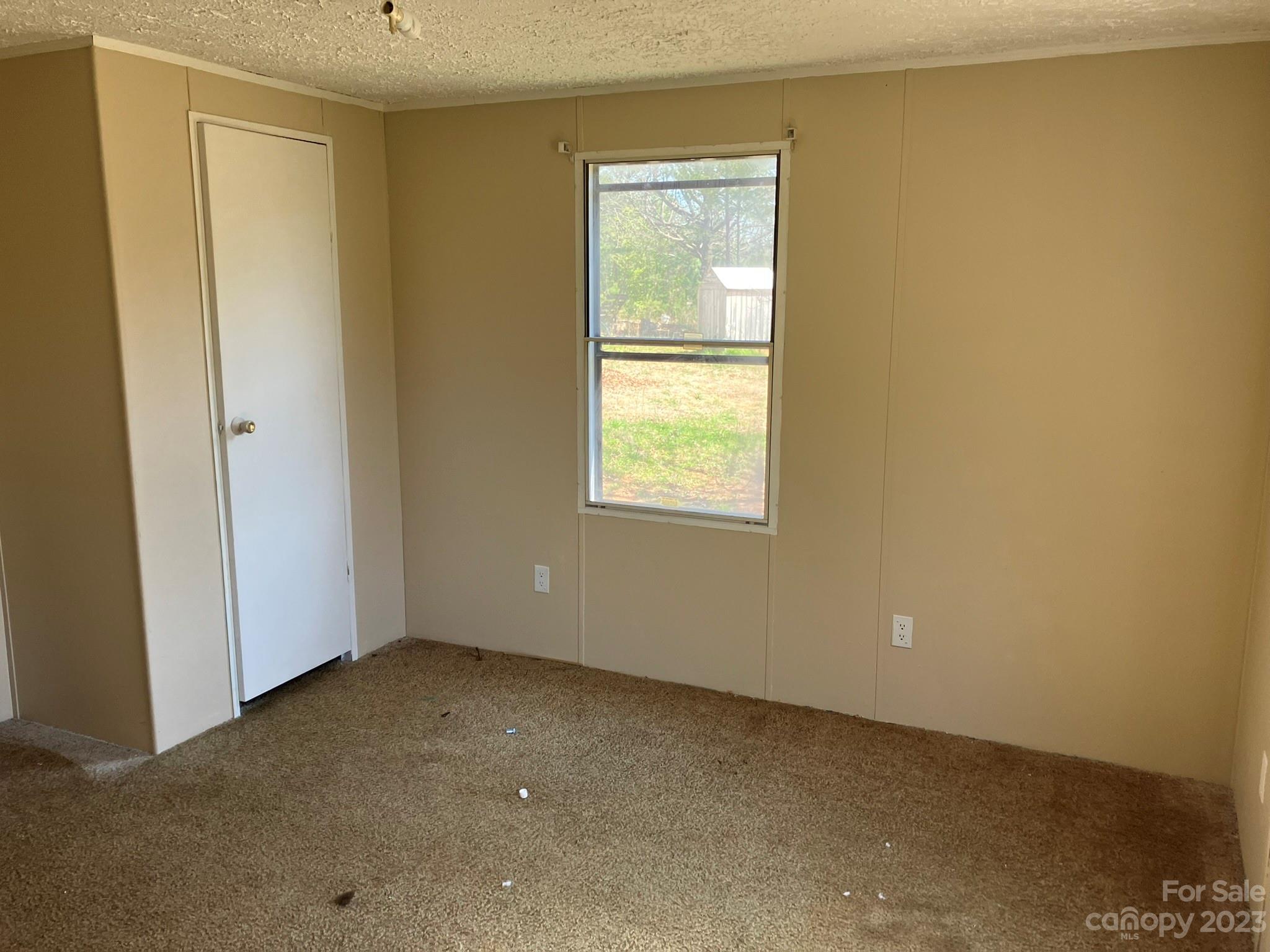 248 Old Ross Road, Unit 2 Spindale, NC 28160 - Photo 7 of 16 an empty room with a window