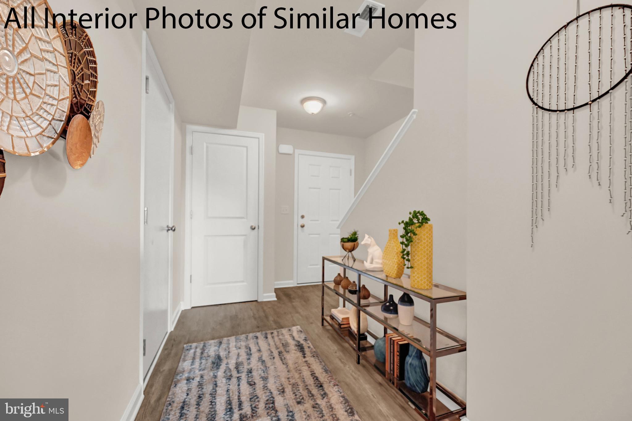 21 Landing Place, Unit 21 York, PA 17408 - Photo 4 of 27 a view of a hallway with wooden floor