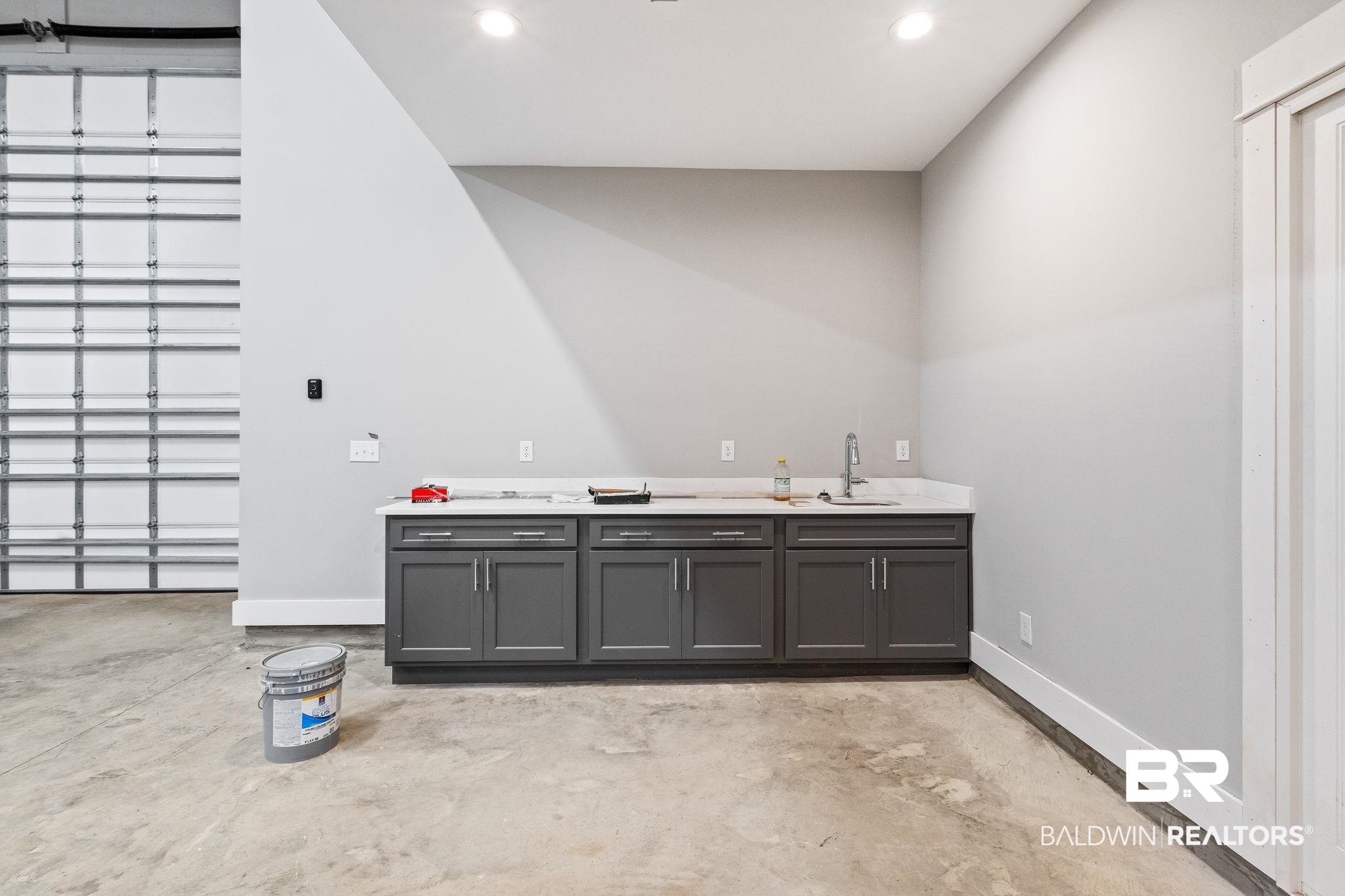 12441 Reunion Place Foley, AL 36535 - Photo 29 of 31 Interior space featuring gray cabinetry and sink