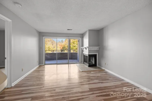 a kitchen with stainless steel appliances granite countertop a refrigerator stove a sink dishwasher and microwave with cabinets