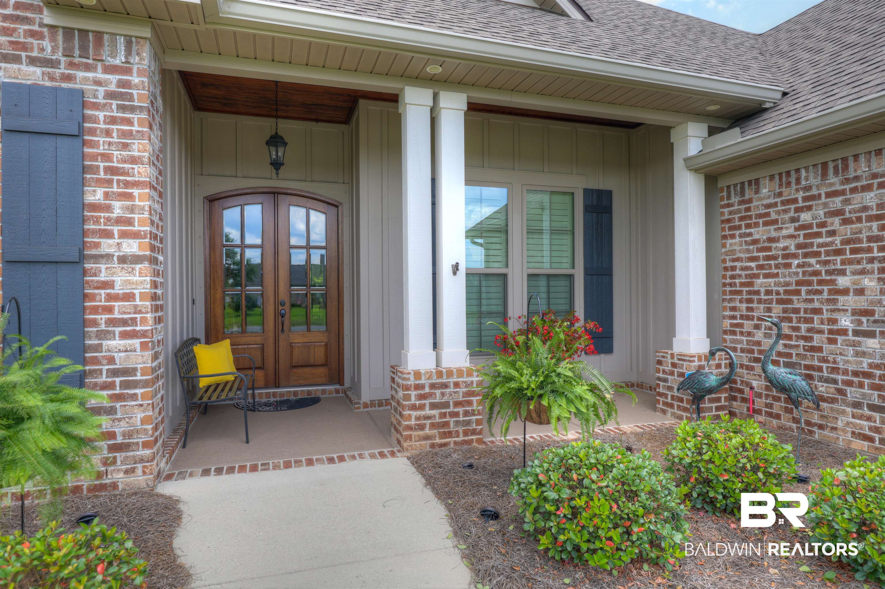 10588 Leesburg Pike Daphne, AL 36526 - Photo 4 of 29 View of exterior entry featuring covered porch