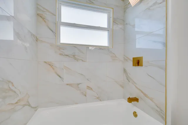 a bathroom with a bathtub