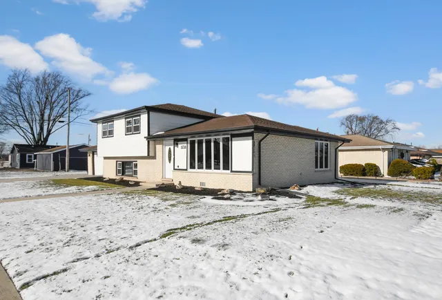 a view of a house with a patio