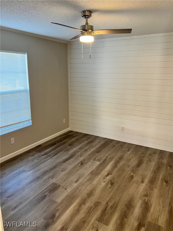 722 Higgins Road North Fort Myers, FL 33917 - Photo 11 of 14 a view of empty room with wooden floor