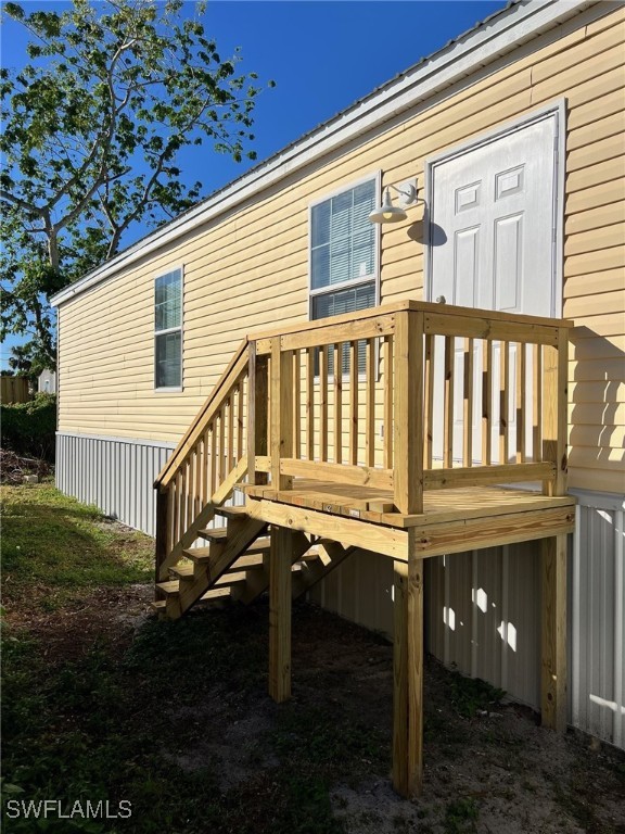722 Higgins Road North Fort Myers, FL 33917 - Photo 4 of 14 a view of a house with backyard and porch