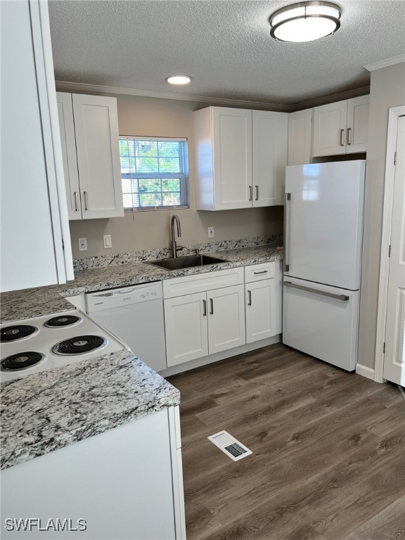 722 Higgins Road North Fort Myers, FL 33917 - Photo 6 of 14 a kitchen with granite countertop a sink cabinets a window and stainless steel appliances