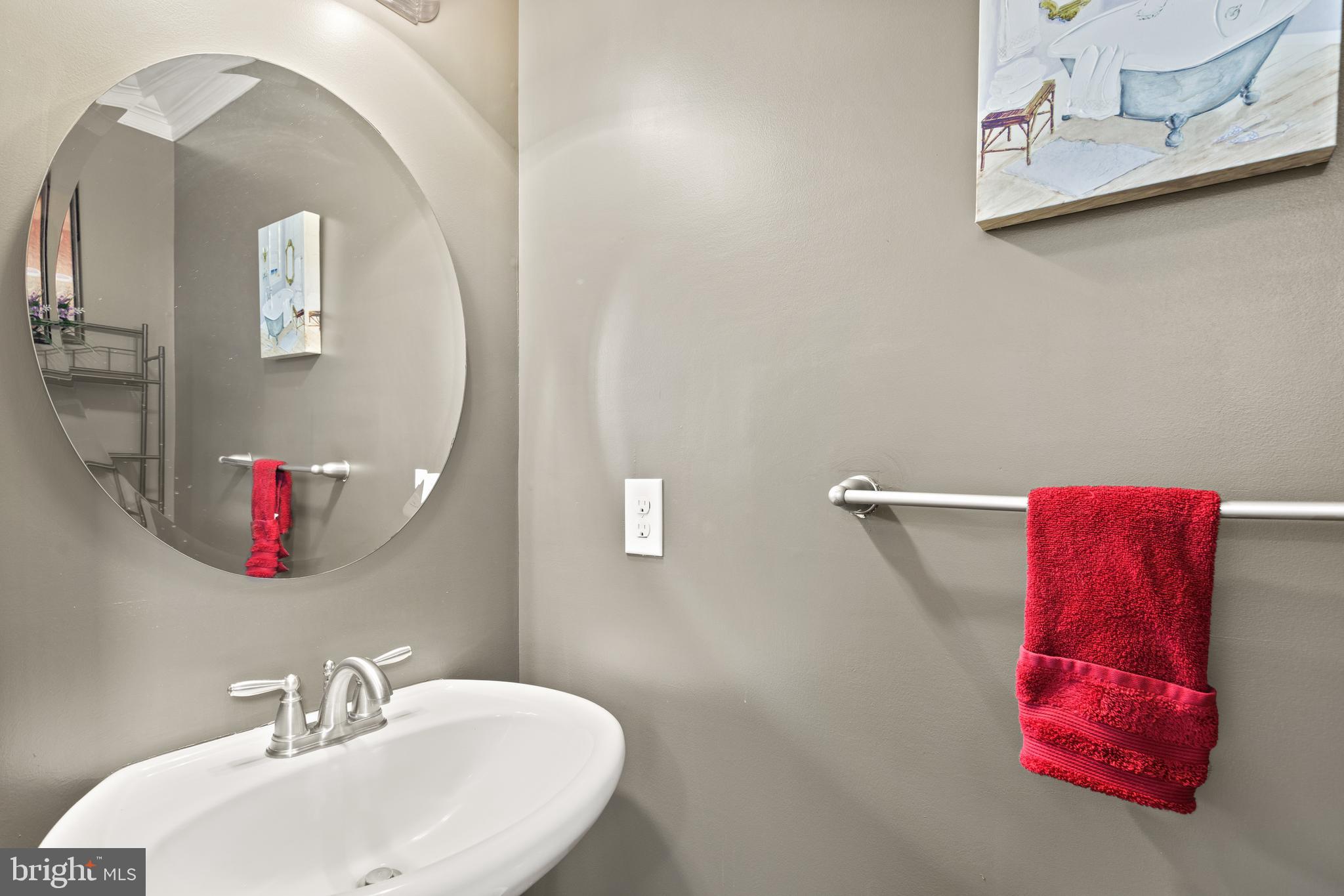 196 Bobbys Branch Road Millsboro, DE 19966 - Photo 20 of 37 a bathroom with a sink and a mirror