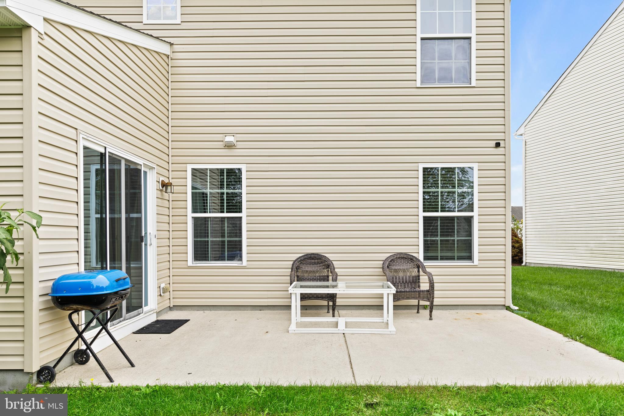 196 Bobbys Branch Road Millsboro, DE 19966 - Photo 35 of 37 a front view of a house with a yard and a table