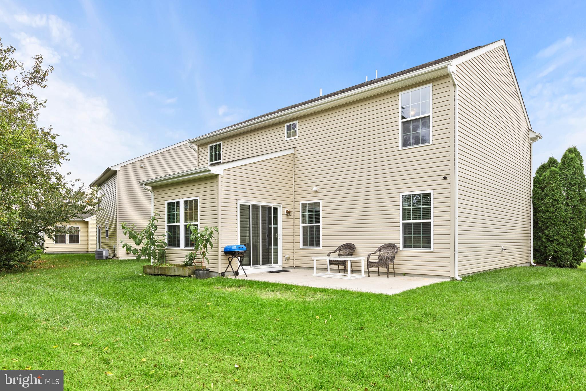 196 Bobbys Branch Road Millsboro, DE 19966 - Photo 37 of 37 a front view of house with yard and chairs