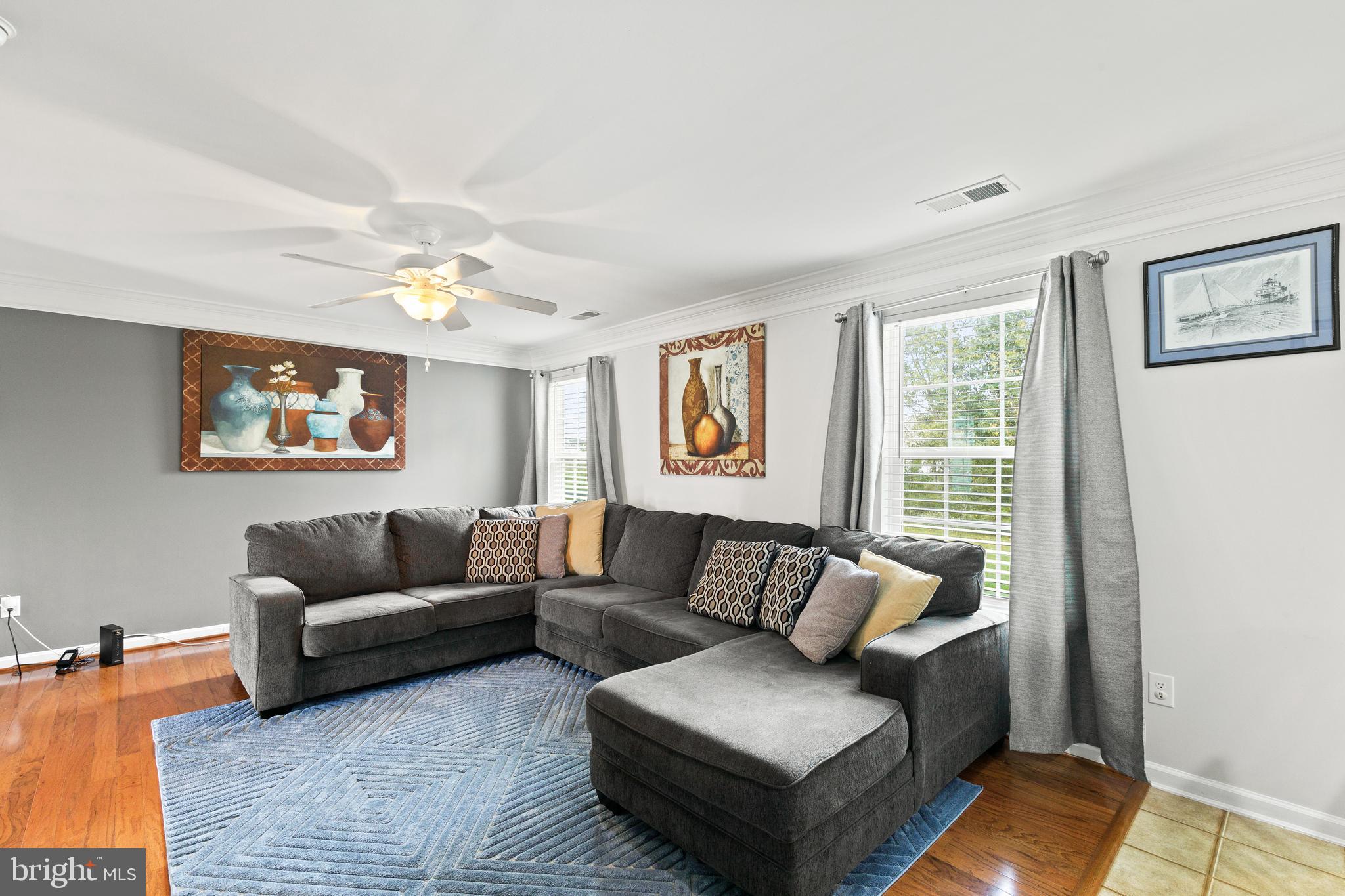 196 Bobbys Branch Road Millsboro, DE 19966 - Photo 7 of 37 a living room with furniture and a window