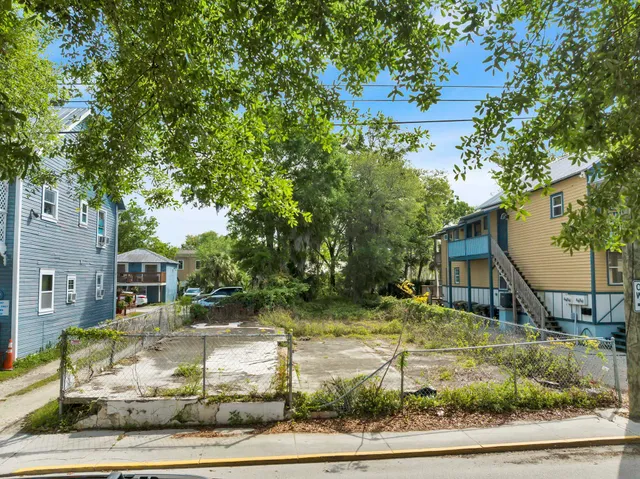 a view of a house with a small yard