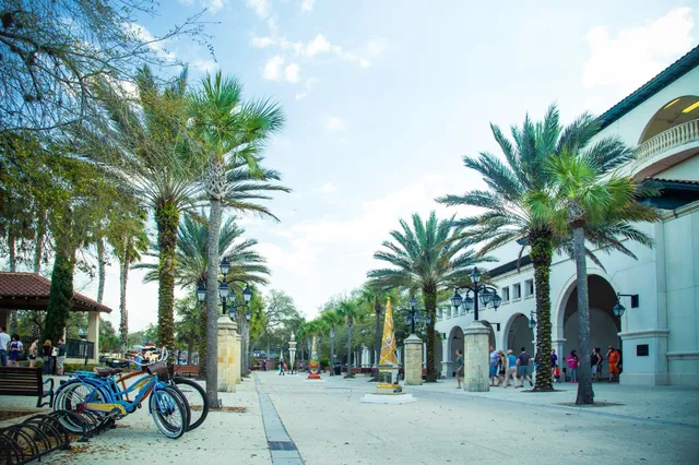 a view of bike storage next to a road