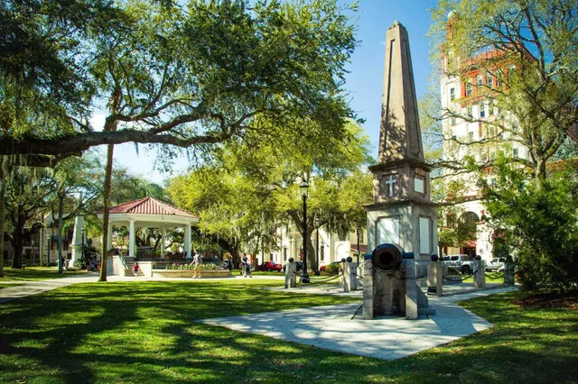 a garden view with a fountain
