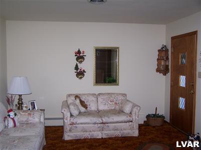 722 Charles Road Phillipsburg, NJ 08865 - Photo 6 of 10 liviing room with beautiful hardwood floors under carpet.