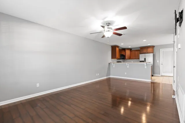 a view of a kitchen with an empty space and a kitchen view