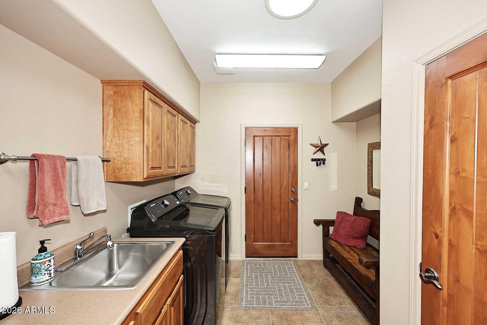 27921 North Quail Spring Road Rio Verde, AZ 85263 - Photo 16 of 49 a kitchen with a sink stove top oven and refrigerator