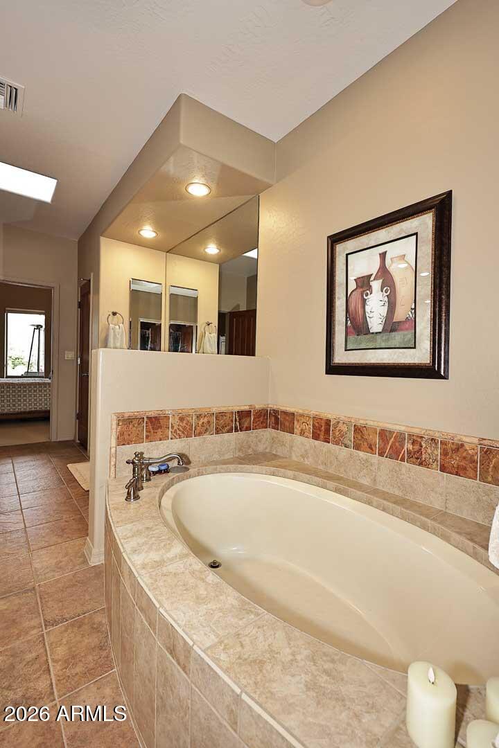 27921 North Quail Spring Road Rio Verde, AZ 85263 - Photo 25 of 49 a bathroom with a tub and sink