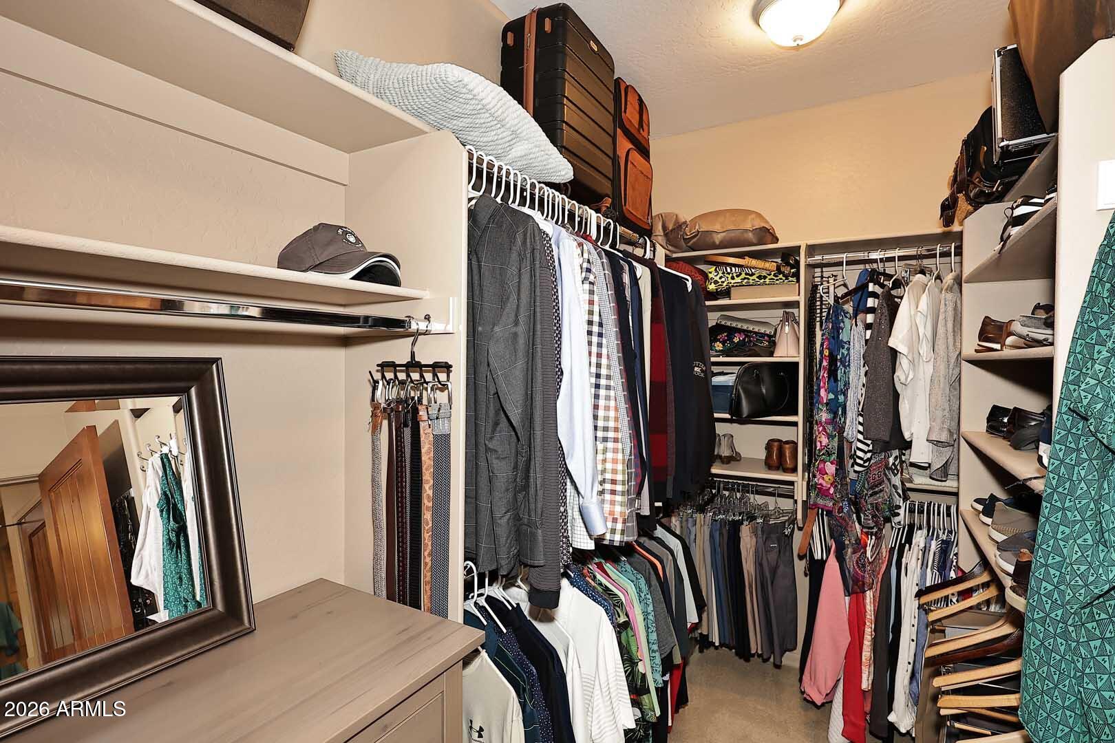 27921 North Quail Spring Road Rio Verde, AZ 85263 - Photo 27 of 49 a view of walk in closet with clothes