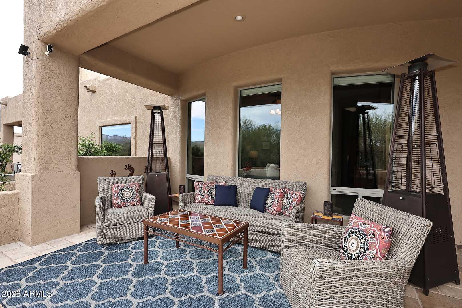 27921 North Quail Spring Road Rio Verde, AZ 85263 - Photo 32 of 49 a living room with furniture and a potted plant