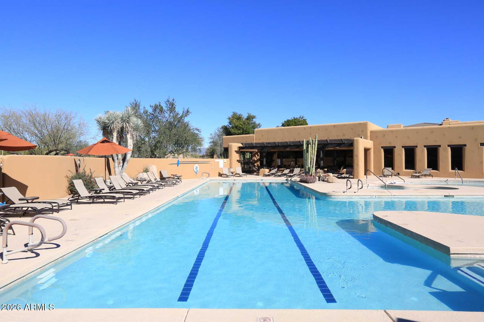 27921 North Quail Spring Road Rio Verde, AZ 85263 - Photo 45 of 49 a view of a house with pool and chairs