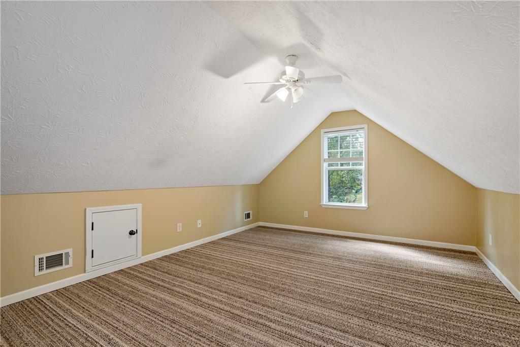 750 Rock Springs Road Lula, GA 30554 - Photo 25 of 72 wooden floor in an empty room with a window