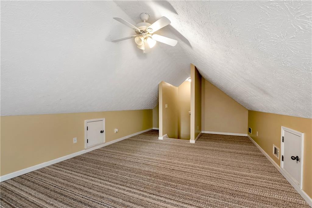 750 Rock Springs Road Lula, GA 30554 - Photo 26 of 72 a view of an empty room with wooden floor