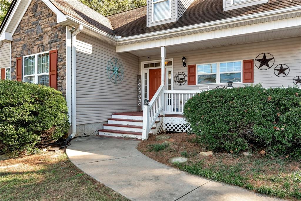 750 Rock Springs Road Lula, GA 30554 - Photo 3 of 72 a front view of a house with a yard