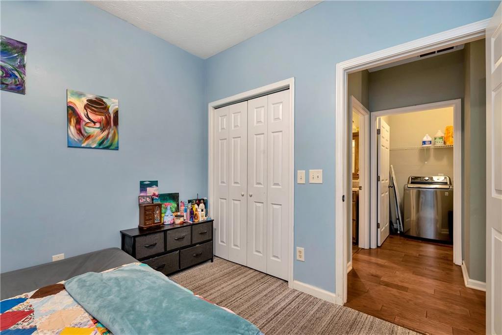750 Rock Springs Road Lula, GA 30554 - Photo 35 of 72 a living room with walk in closet and a window