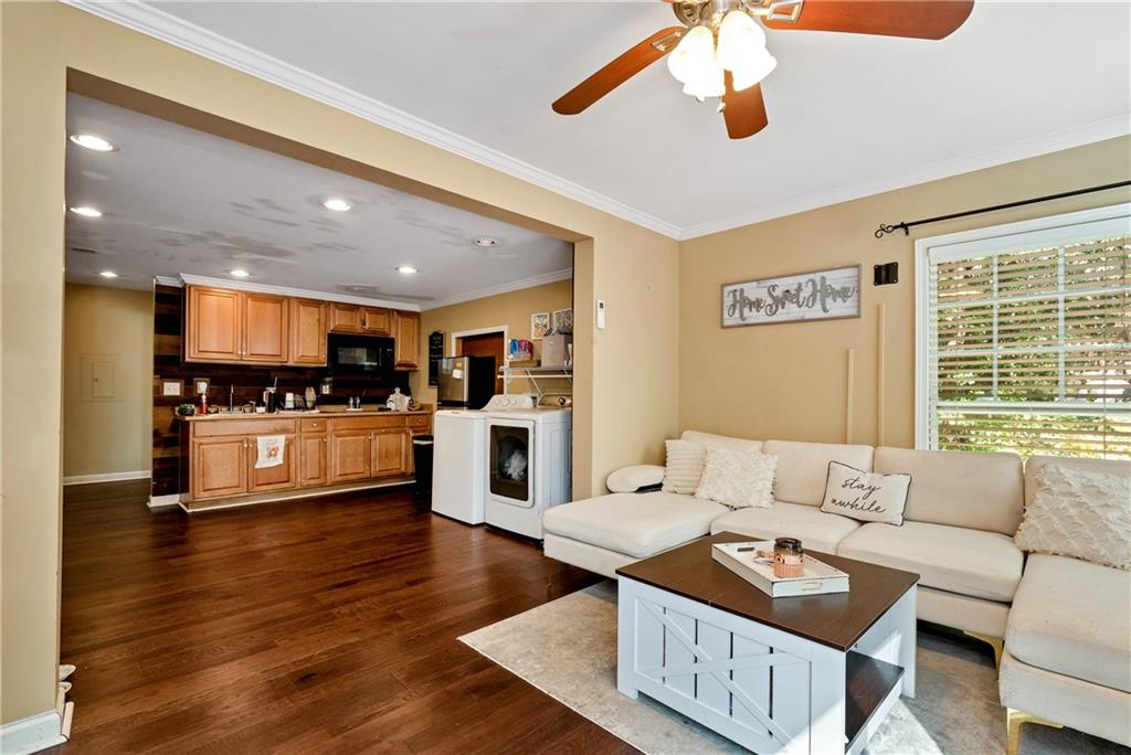750 Rock Springs Road Lula, GA 30554 - Photo 40 of 72 a living room with furniture and kitchen view