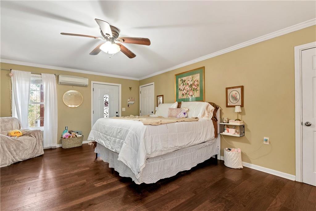 750 Rock Springs Road Lula, GA 30554 - Photo 49 of 72 a bed room with a bed and window