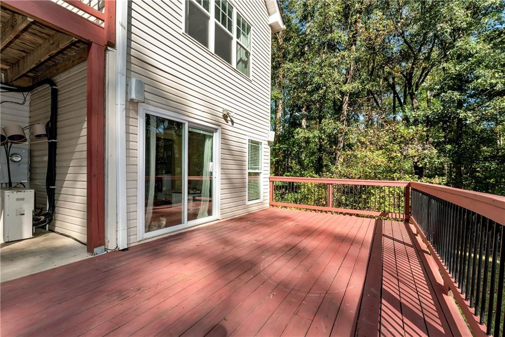 750 Rock Springs Road Lula, GA 30554 - Photo 53 of 72 a view of balcony with wooden floor and fence
