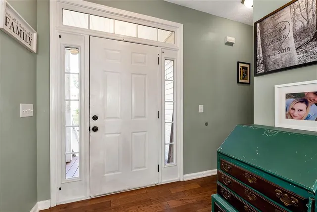 a kitchen with a refrigerator stove and microwave