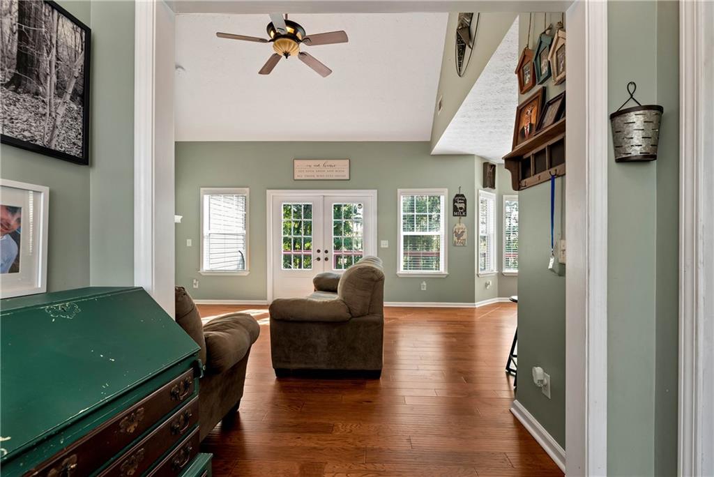 750 Rock Springs Road Lula, GA 30554 - Photo 7 of 72 a living room with furniture and a window