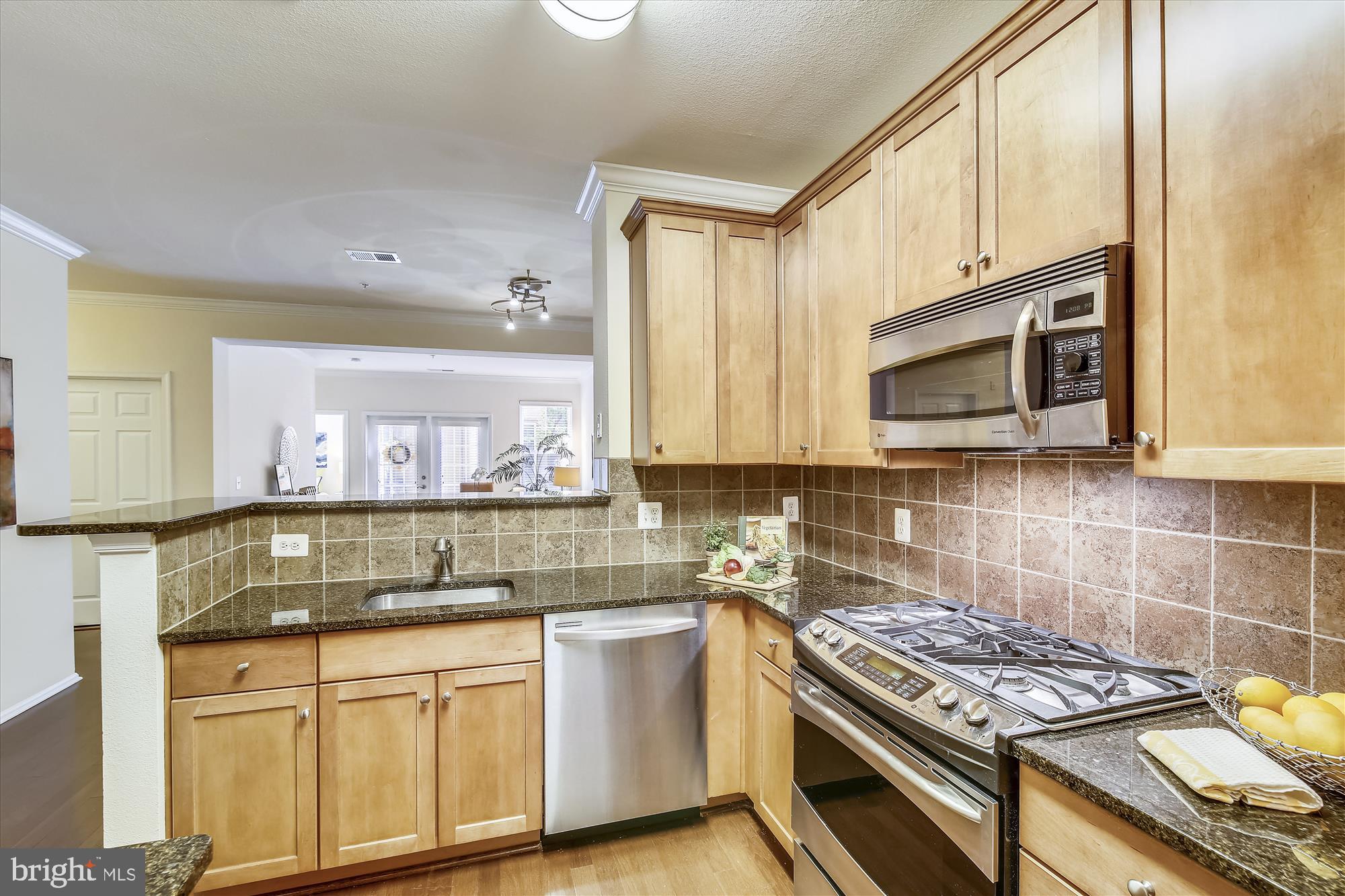 11800 Old Georgetown Road, Unit 1225 North Bethesda, MD 20852 - Photo 6 of 68 GAS RANGE AND BUILT-IN MICROWAVE