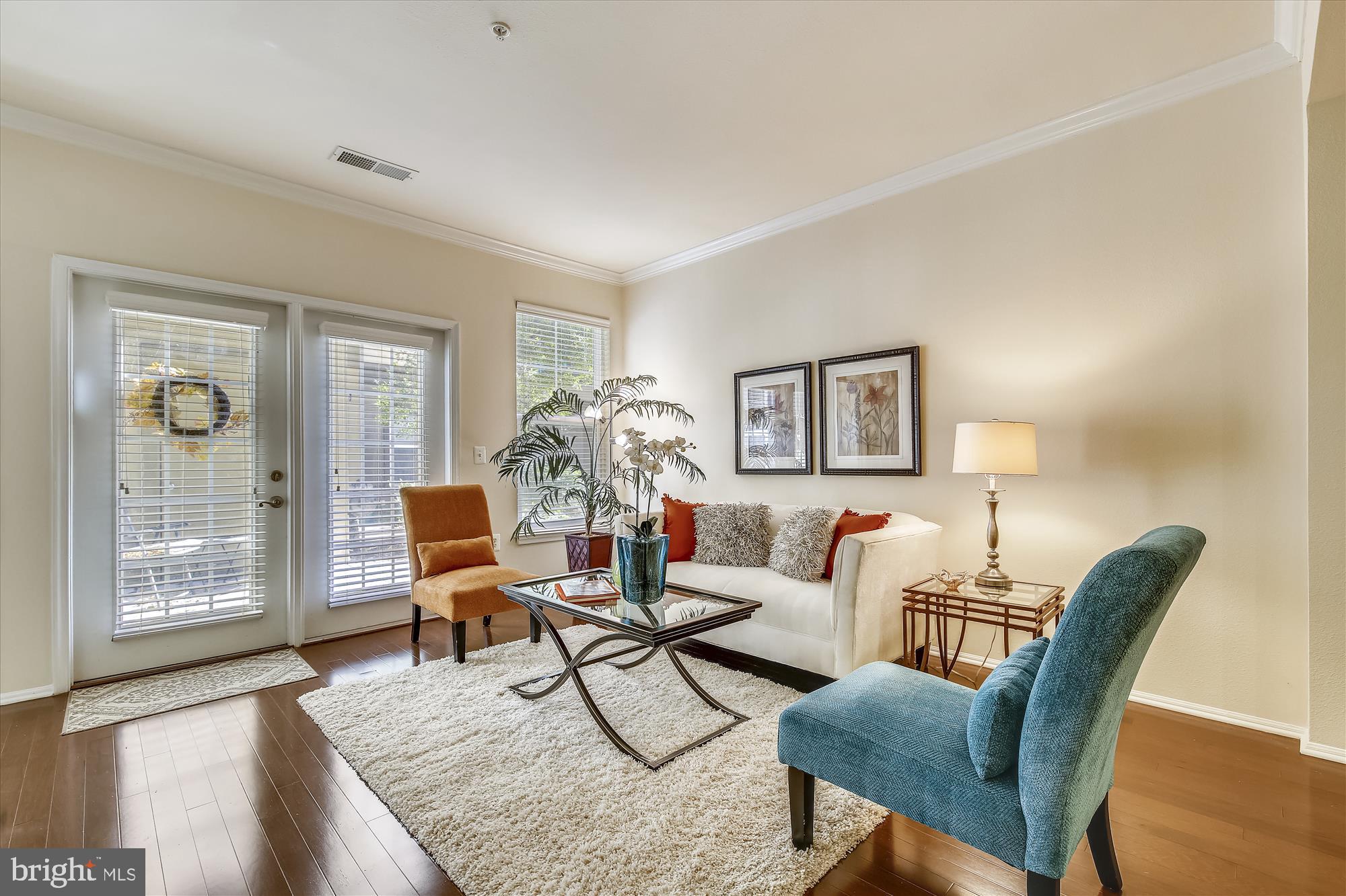 11800 Old Georgetown Road, Unit 1225 North Bethesda, MD 20852 - Photo 9 of 68 SUNLIT LIVING ROOM WITH WALKOUT TO PATIO