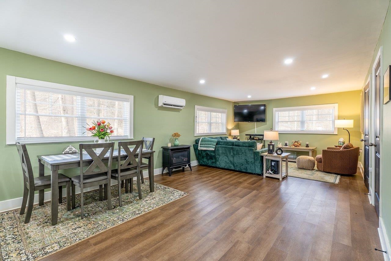 29 Shenandoah Mountain Road Sugar Grove, WV 26815 - Photo 19 of 52 a view of a dining room with furniture window and wooden floor