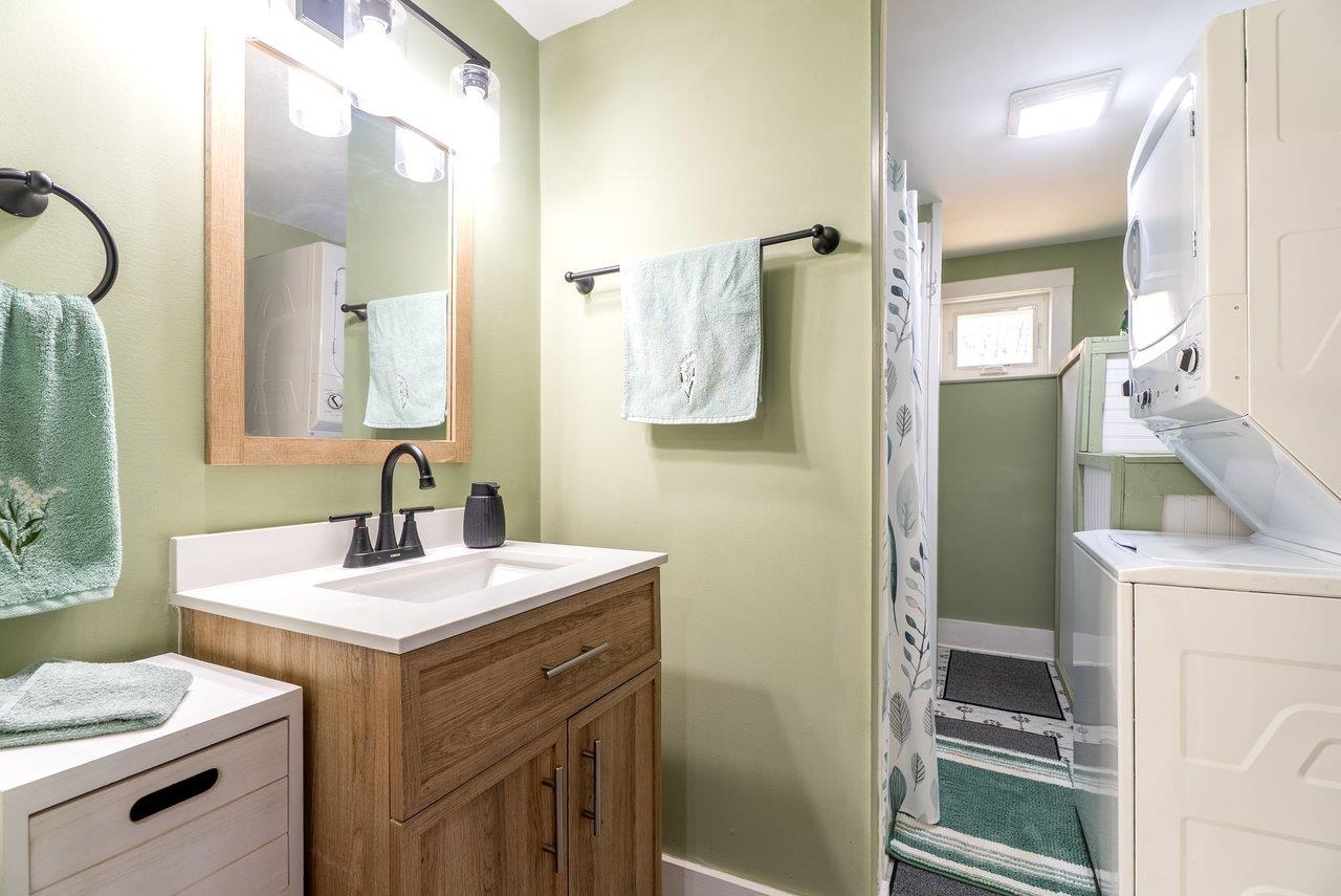 29 Shenandoah Mountain Road Sugar Grove, WV 26815 - Photo 31 of 52 a bathroom with a sink and a mirror