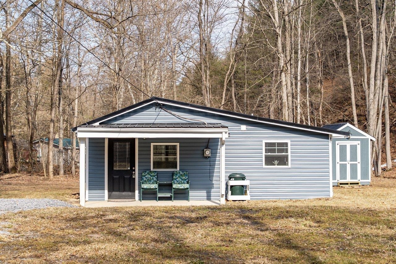 29 Shenandoah Mountain Road Sugar Grove, WV 26815 - Photo 35 of 52 a front view of a house with a yard